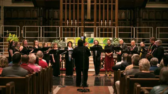 Border CrosSing chorus with director in front